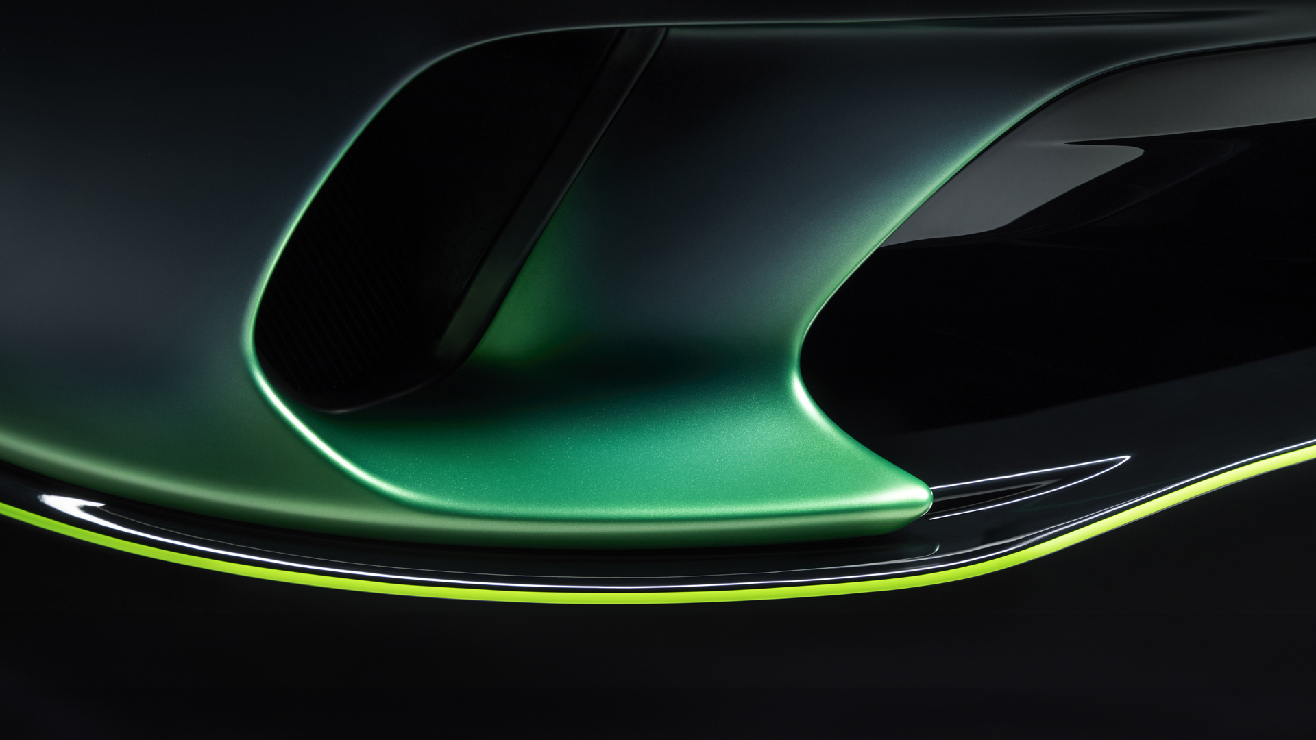  A close-up abstract shot of a unique custom paint finish on a McLaren body panel, highlighting the work of McLaren Special Operations (MSO)