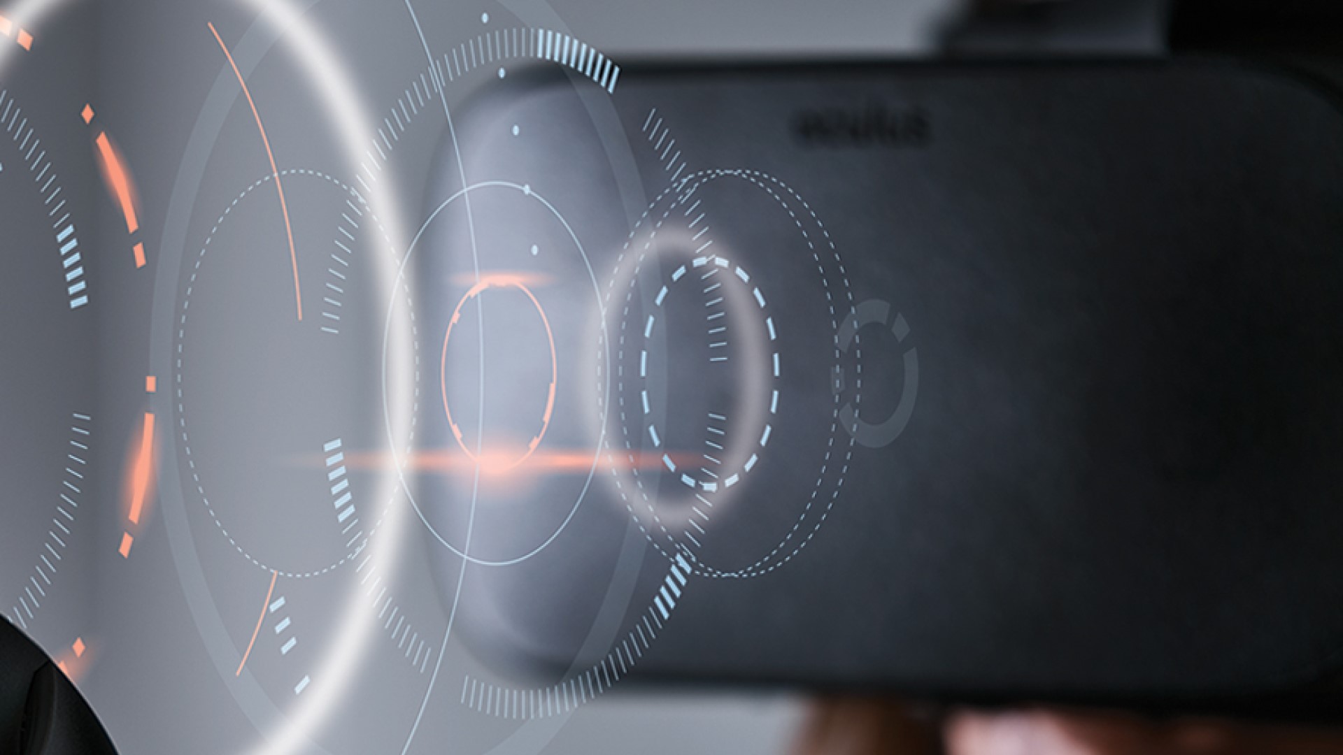 A hero shot for the McLaren Tech Club, showing a VR headset and a futuristic graphical interface.