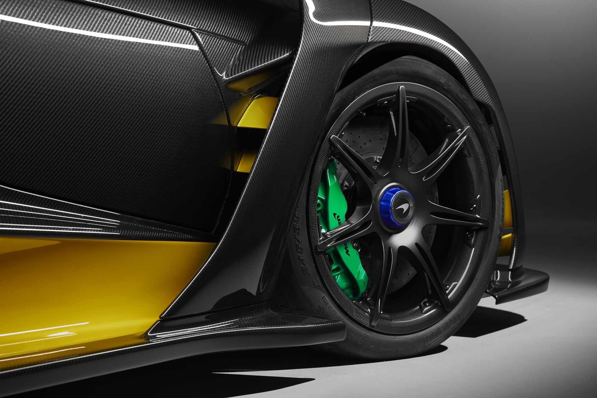 Mclaren MSO car wheel with green caliper. 