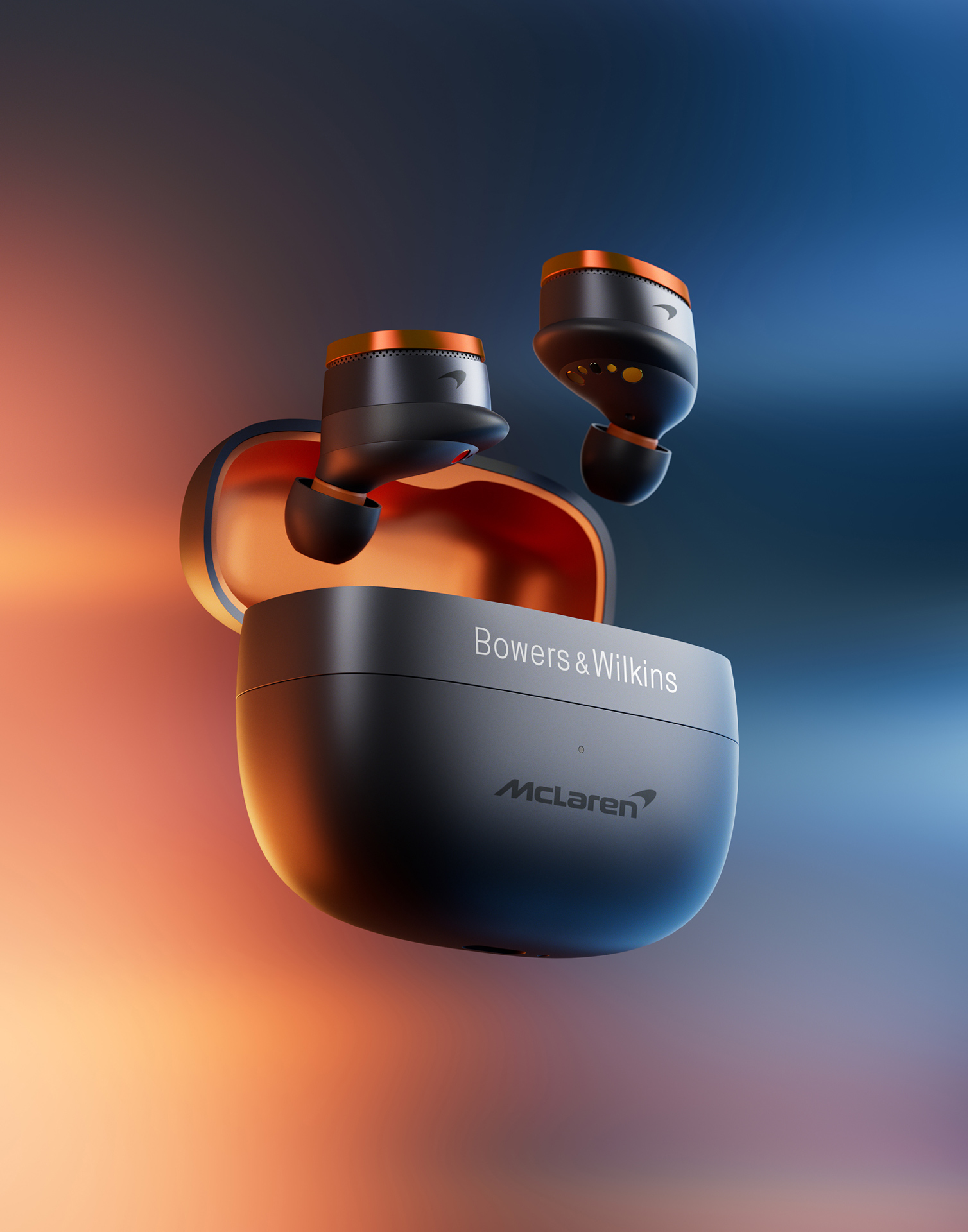 Floating set of Bowers & Wilkins Pi8 McLaren Edition headphones on a blurry multicoloured background. Earbuds are rising out over the open case.