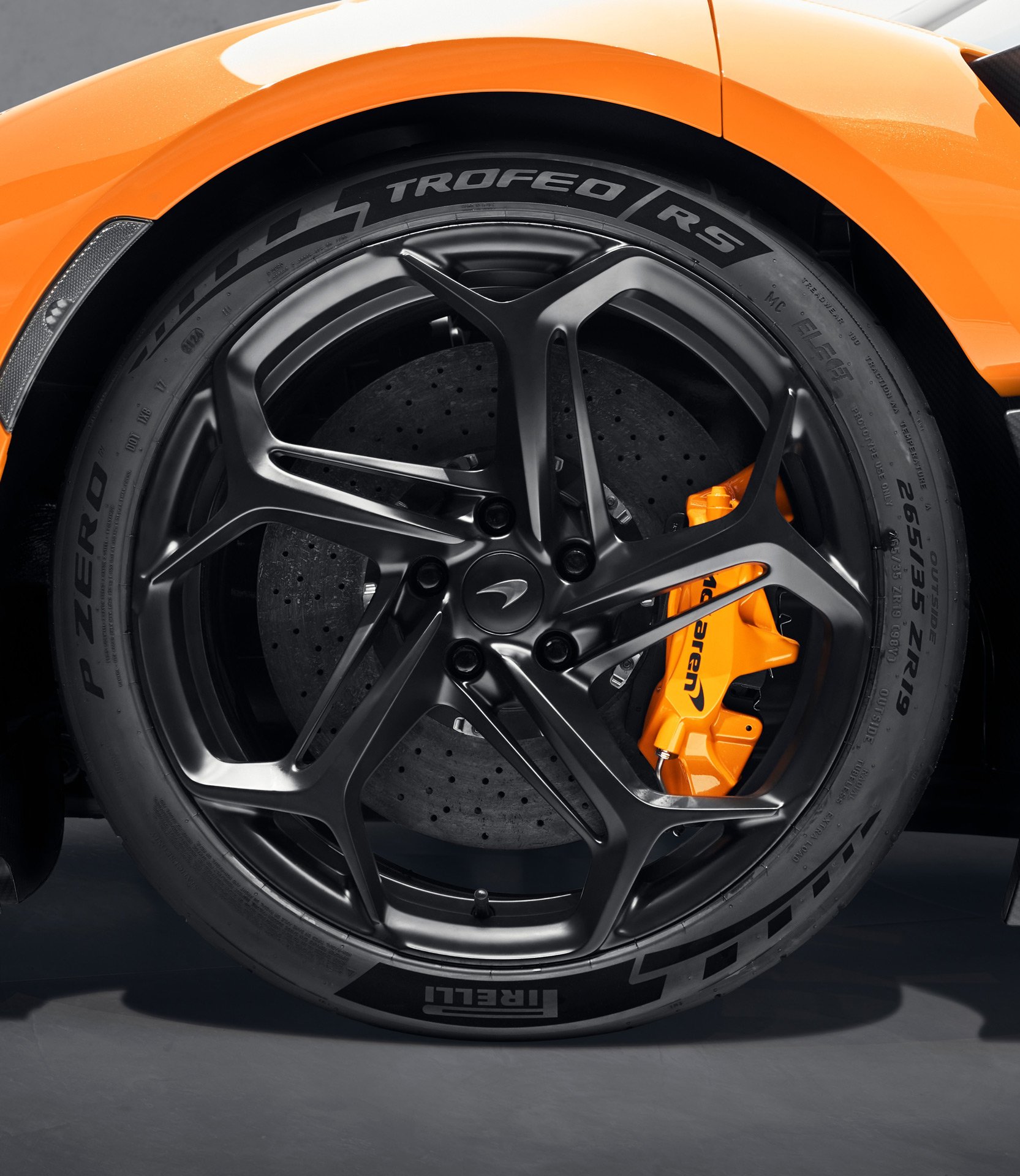 Bespoke Pirelli tyre on an orange McLaren.