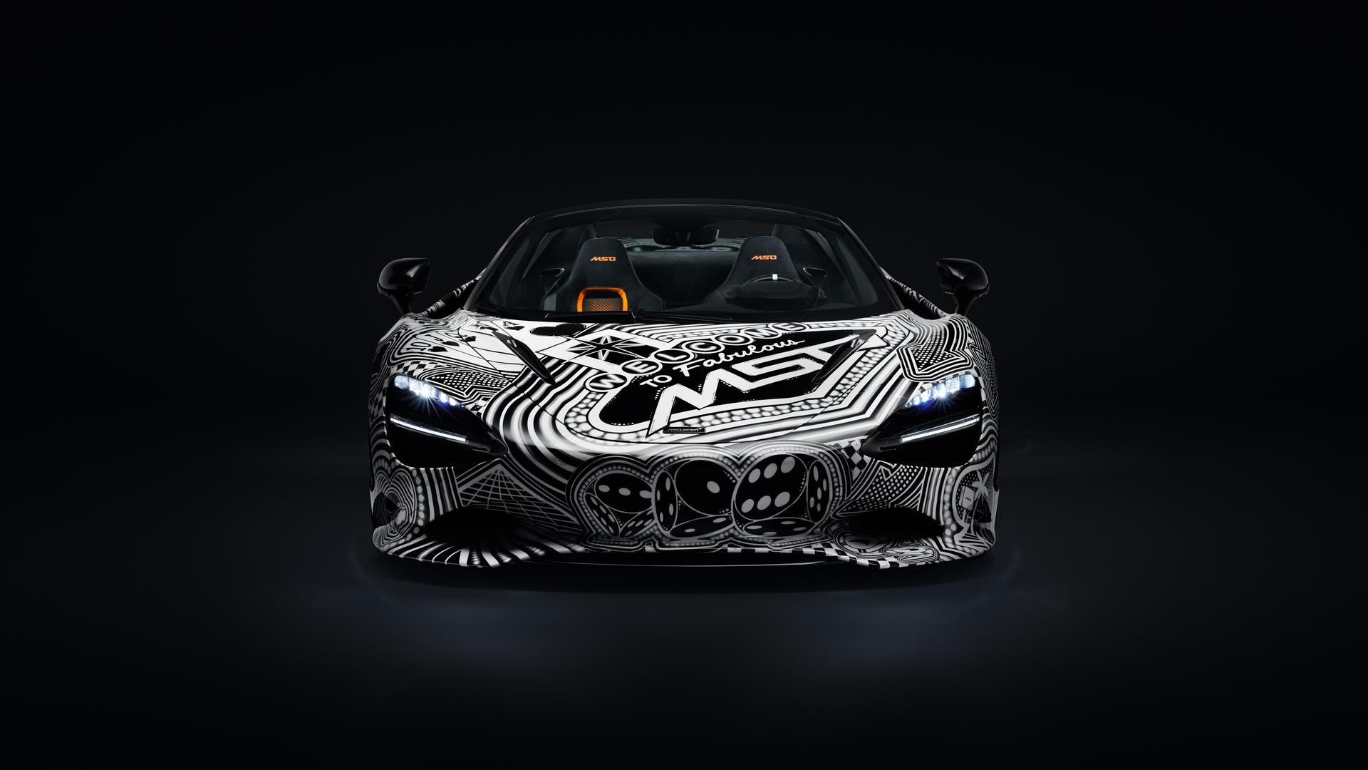 Direct front view of the McLaren 750S Spider 'Project Viva' by MSO, showcasing the 'Welcome to Fabulous' design integrated into the bespoke, black-and-white livery.
