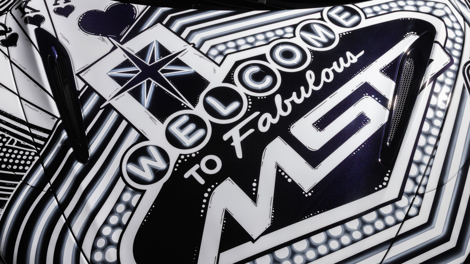 Detailed close-up of the MSO Project Viva bonnet graphic featuring a neon-style 'Welcome to Fabulous' text and the MSO logo, symbolizing the Las Vegas theme.