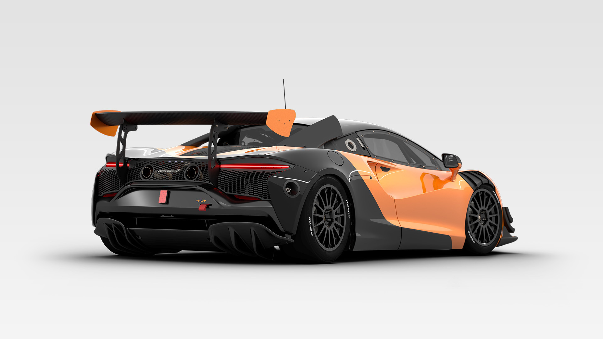 Rear view of copper McLaren Artura Trophy EVO, in a white studio environment.