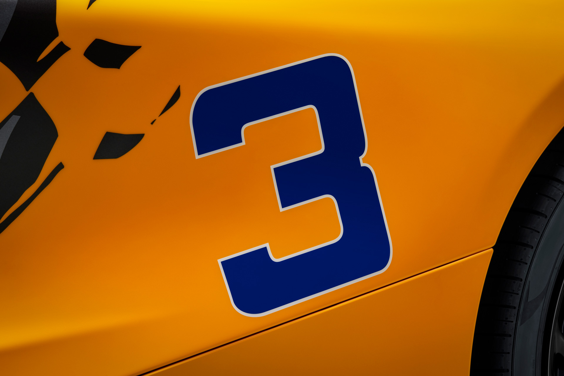 Close up of number 3 on Mclaren 750S with 3-7-59 theme.